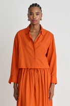BLOUSES/SHIRTS/TOPS Cropped Isolde Button Down in Persimmon Apiece Apart
