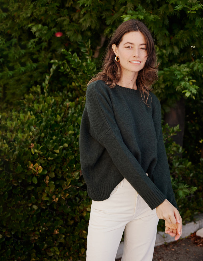 woman in Organic by John Patrick sweater in loden green