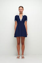 DRESSES/JUMPSUITS Page Knit Polo Mini Dress in Midnight Simkhai