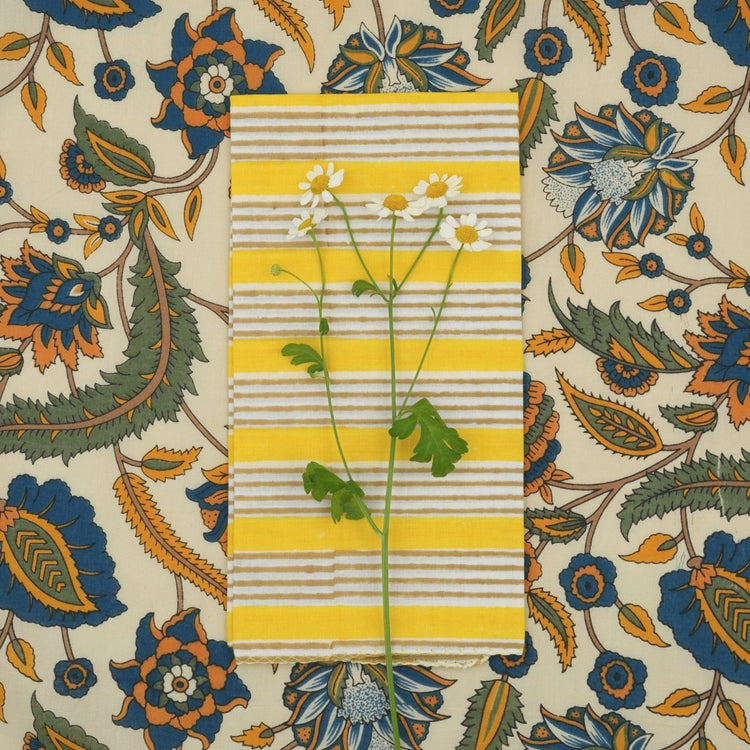 HOME DECOR Suzette Napkin in Alice Gold Suzette a table