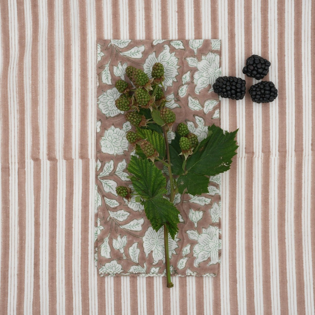 HOME DECOR Suzette Napkin in Iris Almond Suzette a table