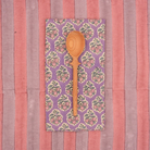 HOME DECOR Suzette Napkin in Oxalis Violet Suzette a table