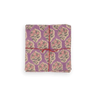 HOME DECOR Suzette Napkin in Oxalis Violet Suzette a table